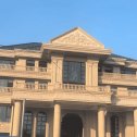 鹤壁黄金麻别墅外墙干挂石材效果示例