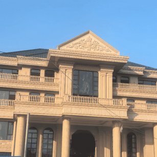 鹤壁黄金麻别墅外墙干挂石材效果示例