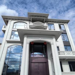 鹤壁白麻别墅外墙干挂石材效果示例