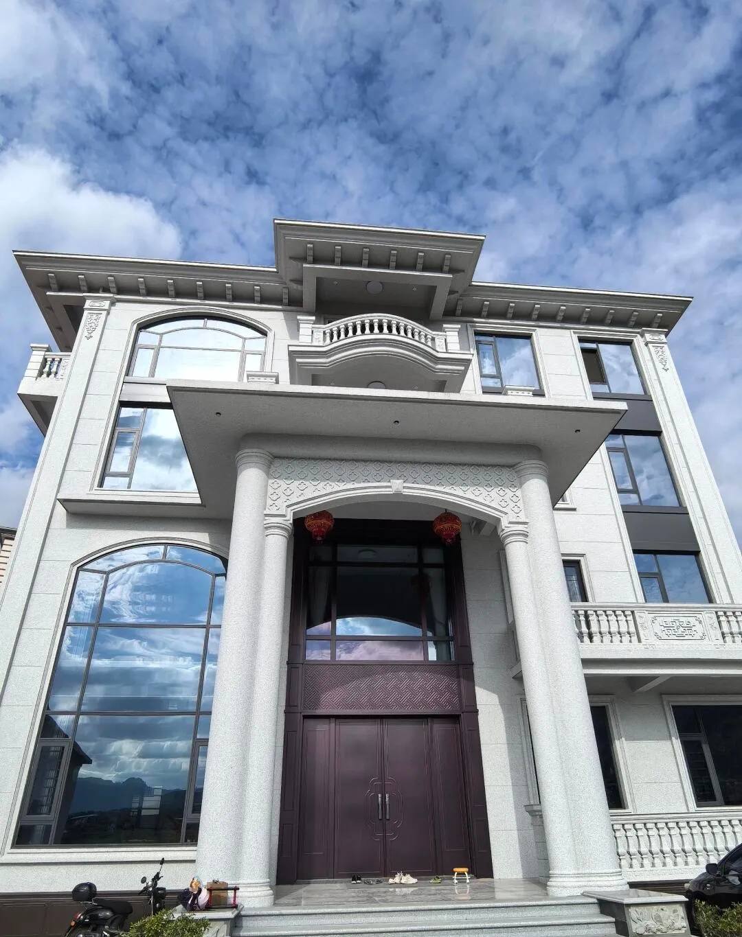 鹤壁白麻别墅外墙干挂石材效果示例