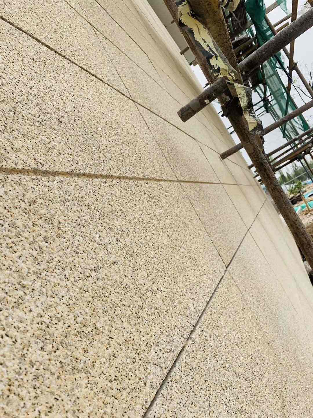 鹤壁 黄金麻花岗岩荔枝面外墙干挂石材效果示例