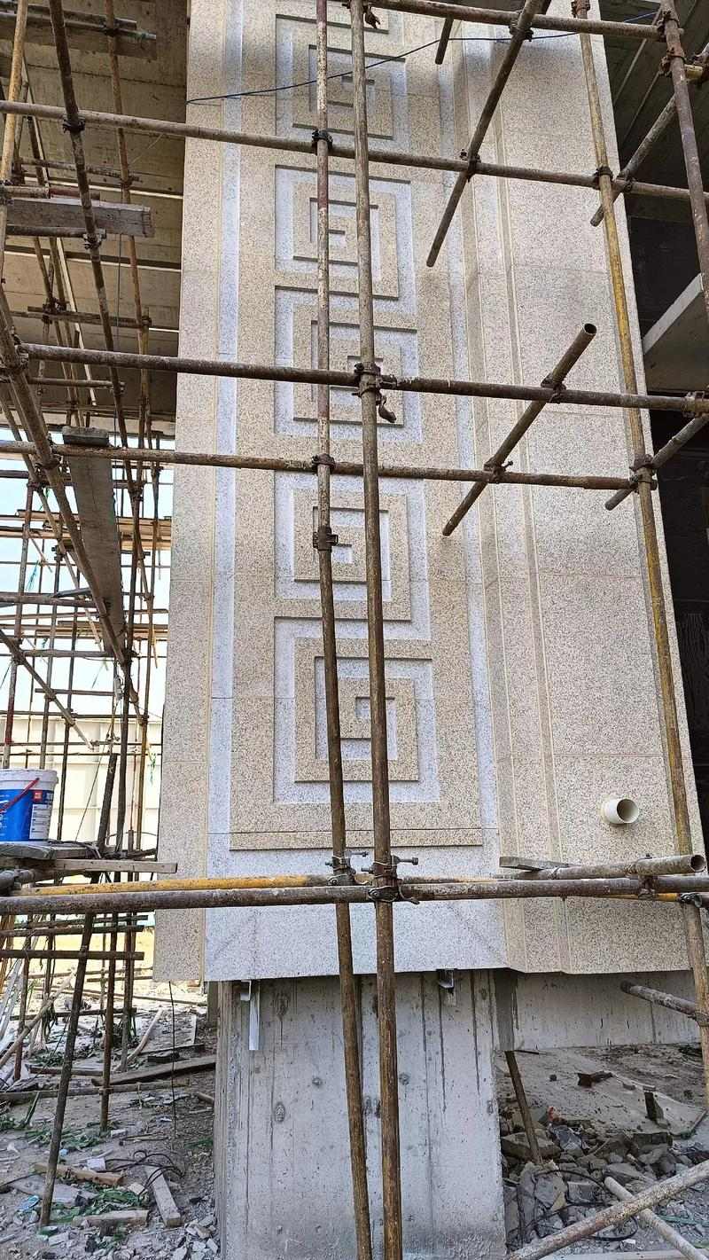 鹤壁 黄金麻花岗岩别墅外墙干挂回纹造型效果